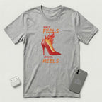 How it Feels Wearing Heels - Red Shoe - T-Shirt - Athletic Heather mockup